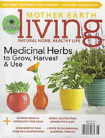 A magazine cover with three different plants in vases.