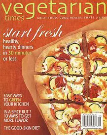A magazine cover with a pizza on it.